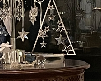 Swarovski lighted chrome Christmas tabletop tree.
10 7/8 x 7 1/4 x 1 15/16 inches