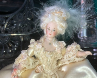 Close up of miniature lady doll