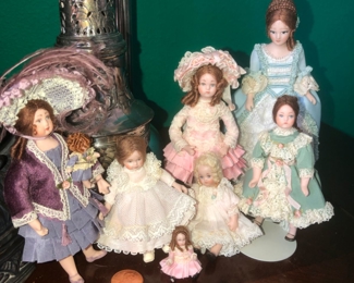 A group of miniature dolls from the collection. Ranging in size from 1” to 5 1/2”. Dolls are in scale for a 12” = 1” dollhouse.