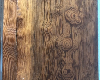 Close up of exotic wood grain detail on the display cabinet.