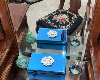 Beautiful a blue Mirror Jewelry box with Brooch top embellishment
Velvet lined