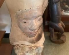 Stone face sculpture 