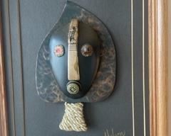 Framed mask by Milson