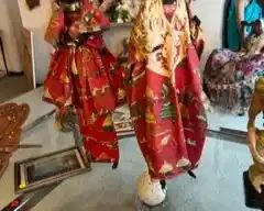 Pair of West African dolls on stands