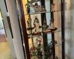Curio Cabinet with Lladro and Thomas Blackshear