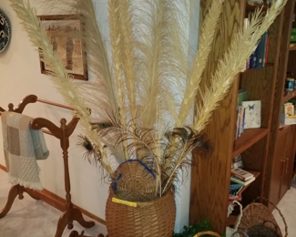 Big wicker basket with follage