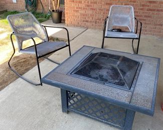 Outdoor fireplace and rocking chairs 