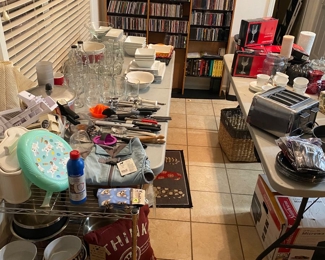 FedEx memorabilia. Many CD’s DVD’s kitchen utensils, etc