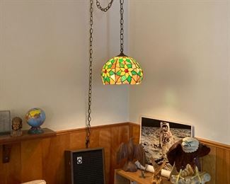 Hanging Glass Lamp; Collection of Wood Carved, Pewter; large ceramic/plaster Eagles; Books on Birds; 2 Shelf Laminate Book Shelf; Moon Poster; Speakers; Small Planet Bank; etc.