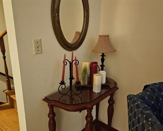 Antique mirror table and candles