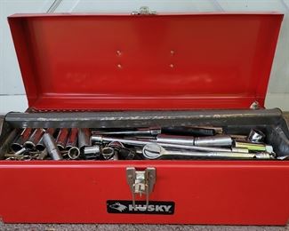 Husky tool box loaded with tools