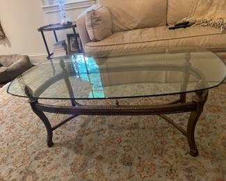 Glass topped coffee table 50"W x 30"D x 19"H 