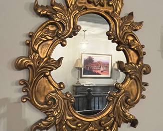 Wood framed gold mirror