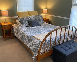 Scandinavian-styled queen curved head/footboard bed, mattress, matched set of nightstands, lamps, linens, and storage ottoman