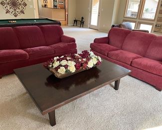 Matched set of 3-cushion couches and large wood cocktail/coffee table 