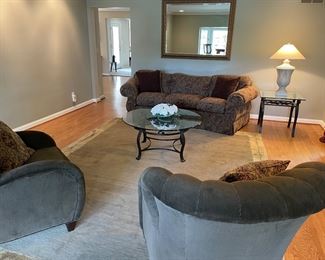 3-cushion couch, matched set of club chairs (velvet), round glass/metal cocktail table, square metal/glass side table, mirror, lamp, and mirror