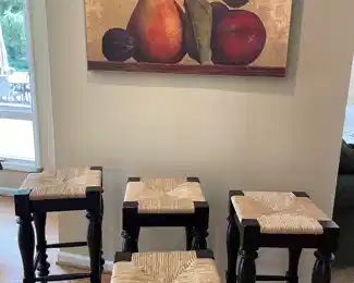 Bar-height stools (3) - can be converted to counter-height, and one counter-height stools, canvas artwork