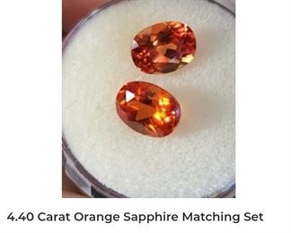 4.4 carat natural fancy orange sapphire pair
