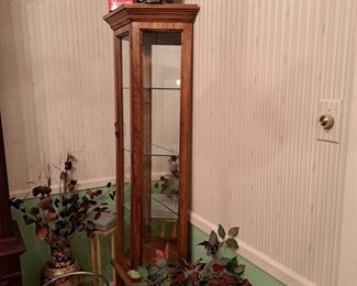 Curio cabinet and Star War collectibles