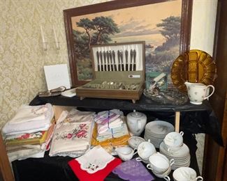Very nice table linens, silverplate flatware
