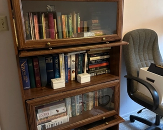 Barrister bookcase with books in office