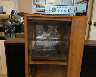 Turntable, receiver with cassette, 8-track, AM/FM and speakers plus a stereo cabinet