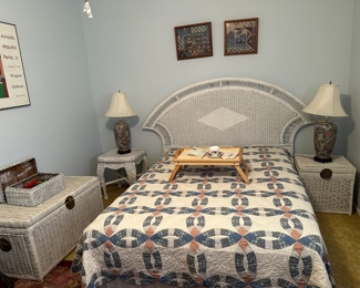 Upstairs bedroom with white wicker bedroom furniture