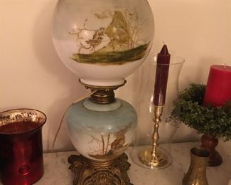Antique Gone-with-the-wind Oil lamp with matching hand painted globes. ornate bronze base. 