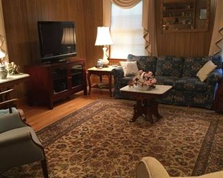 Overview of living room. Large Karastan rug