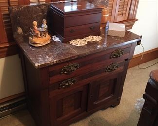 Antique Walnut Washstand with brown Italian marble. This is one of 3 matching pieces of east lake bedroom furniture