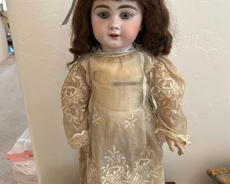 French Bebe doll with original clothing, circa 1902.