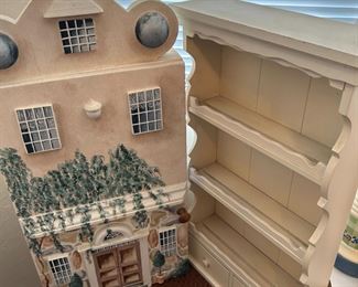 Take home this fun doll house and display shelf.