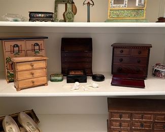 Many, many small jewelry boxes.