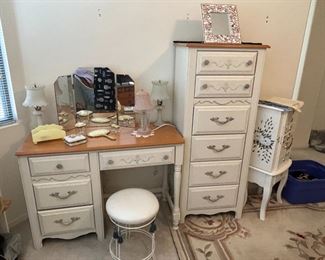 We have a charming vanity with stool, a lingerie chest and a jewelry box.  Check out the corner showing the carved wool room size Chinese rug.