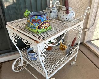 Charming garden metal tea cart.
