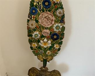 Interesting stamped metal ornamental garden piece.