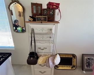 Judith Lieber bags and lingerie chest, vintage mirror and tray.