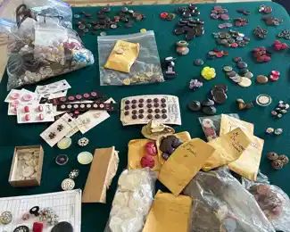 Buttons!  About a peck full in a basket.  Many with cards, some date to the Victorian Era on their original cards.  See pics.