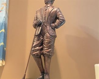 . . . golf statue