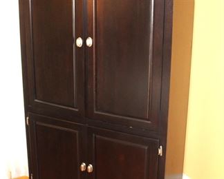 Black Cabinet-Entertainment Center or use as a wardrobe. 47 1/2" w x 22" d x 78" h.