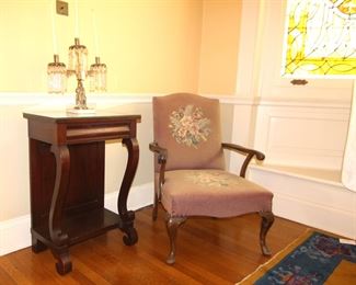 Empire Style Glass top side table,  22" W x 14"D x 32" H. Needlepoint armchair.