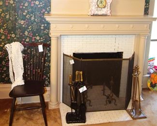 Antique spindle chair, Antique Ansonia China mantel clock, andirons and fireplace tools.