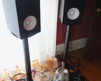 Pair Yamaha HS8 8"  Powered Active Studio Monitor Speakers with Stands. On floor,  Harman/Kardon SoundSticks w/subwoofer. Shure SRH550DJ professional DJ headphones.