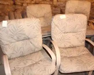Four Patio Chairs.