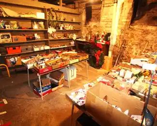 Variety of tools, tool boxes, electrical supplies, painting supplies and Christmas.