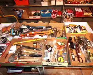 Variety of hand tools, hammers, screw drivers.