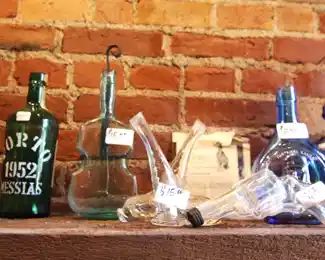 Antique glass figural bottles.