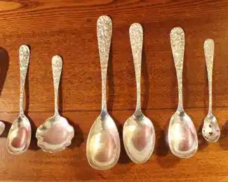 Eight serving spoons of the Repousse pattern.                                 STERLING IS NEVER, EVER LEFT  UNATTENDED.  