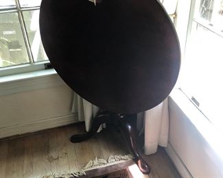 Antique tilt top table