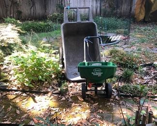 wheelbarrow and fertilizer spreader